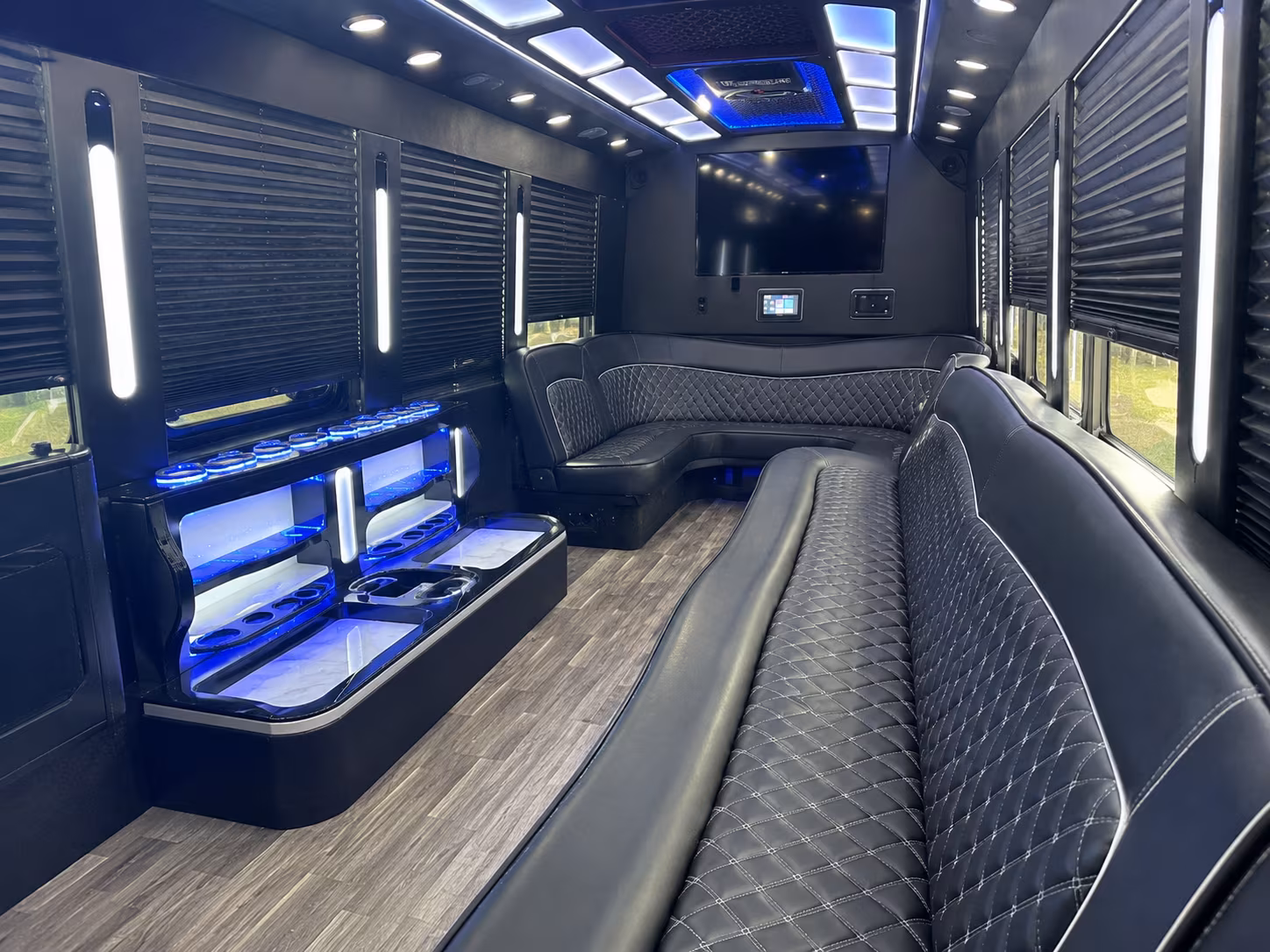 Passenger watching the Inglewood scenery during a regional party bus road trip