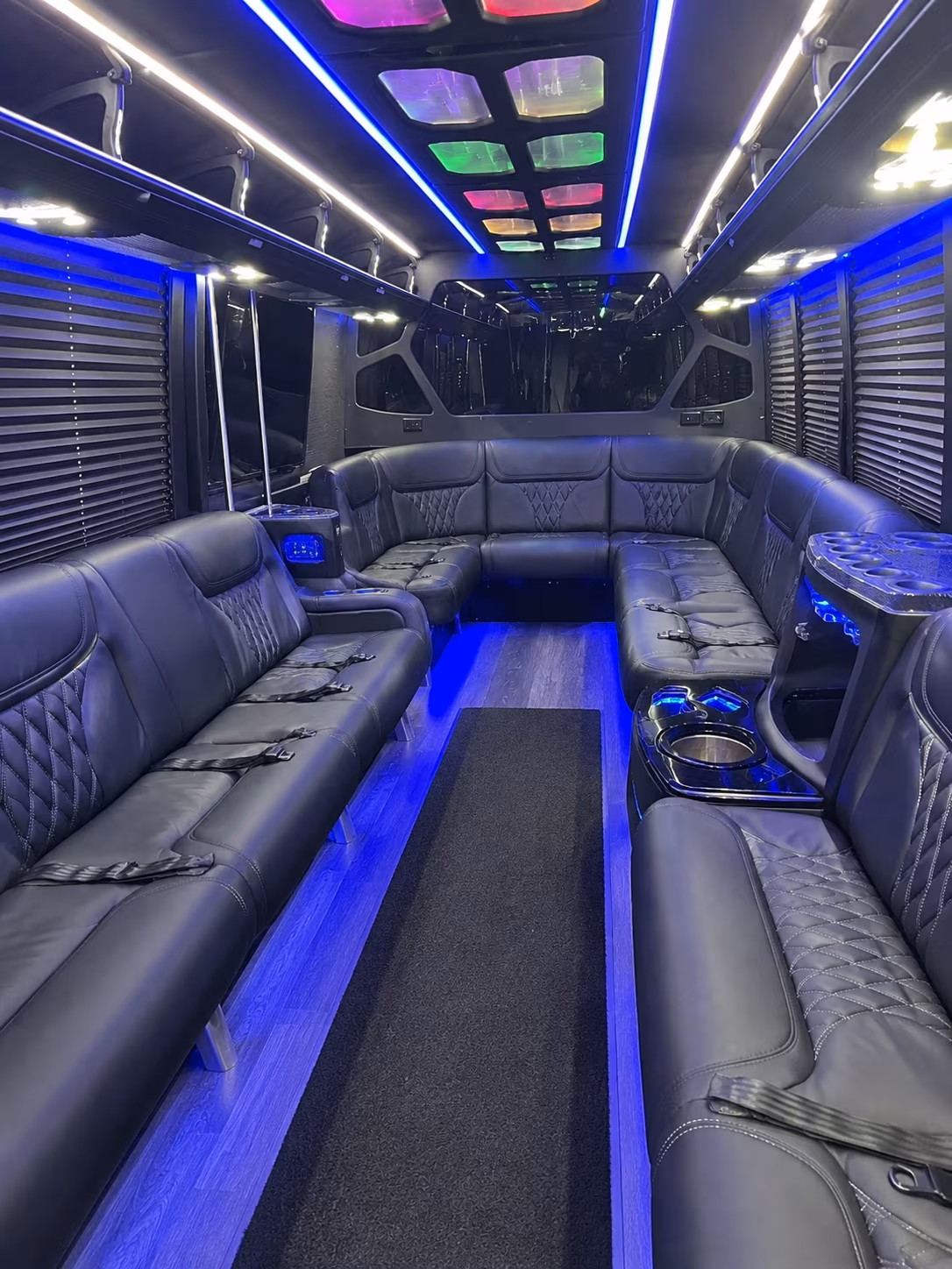 Group beside a Mercedes Sprinter limo in Inglewood